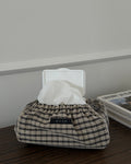 Mocca wet wipes case in brown check cotton on a wooden table